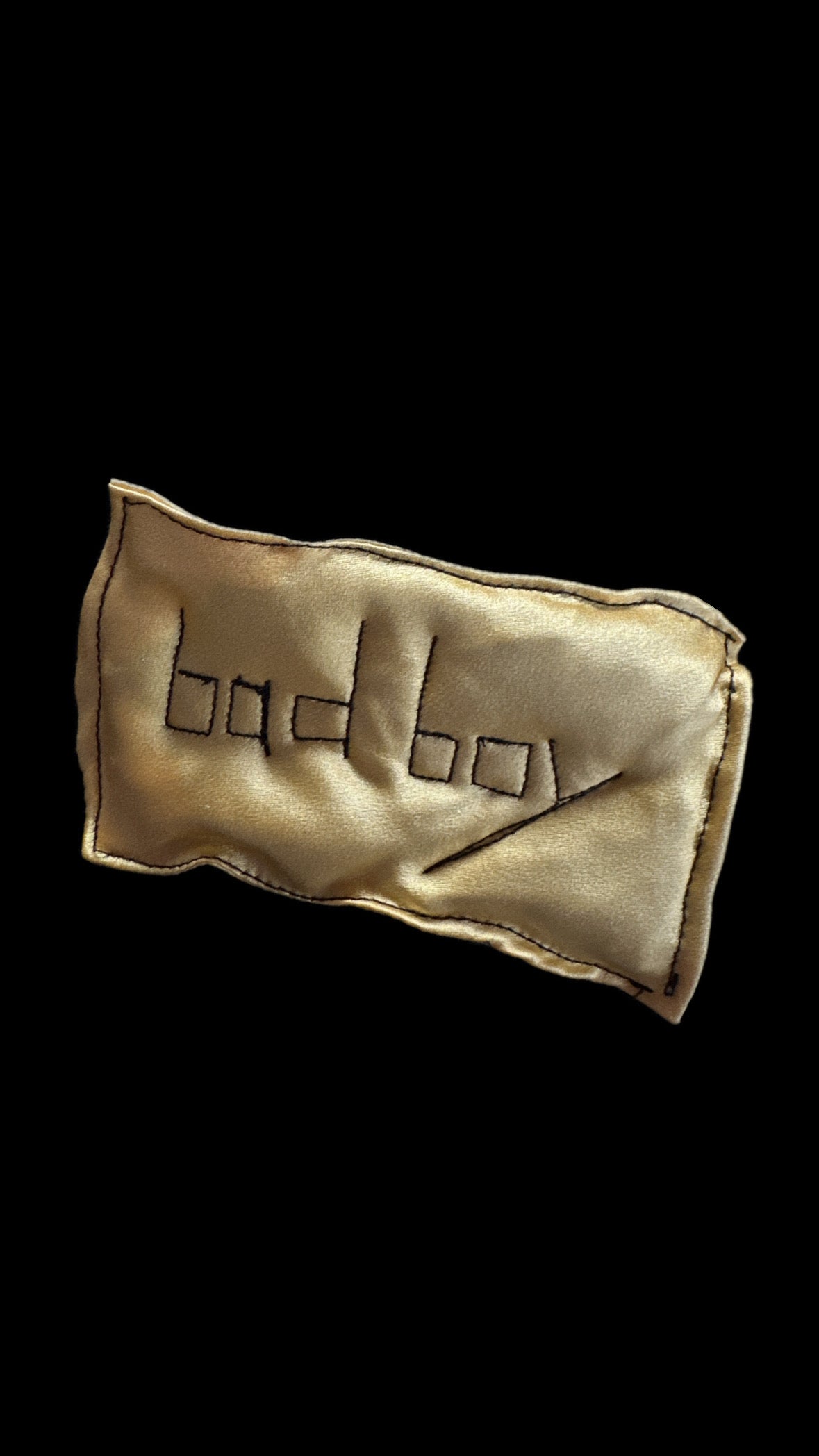 Bad Boy Silk Pillow Clip